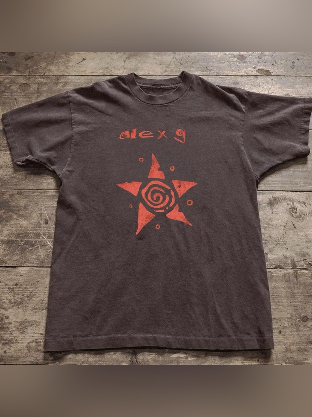 Black Graphic Tee with Red Star Design